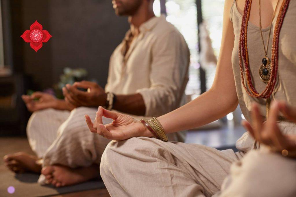 Muladhara Root Chakra red lotus symbol illustration representing grounding, stability, and Earth element energy at the base of the spine.