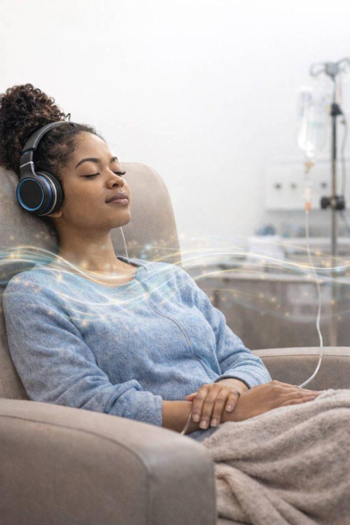 Acute infection support sound session woman relaxing with headphones in calm environment supporting natural recovery